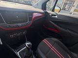 the interior of a car with a red trim and black leather seats