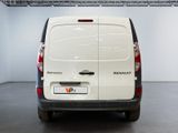 a white van that is parked in a room