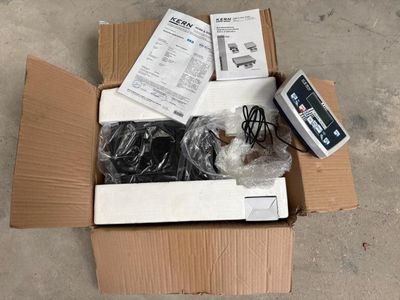 a box with a lot of electronic items in it