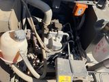 a picture of an engine of a truck that is under the hood