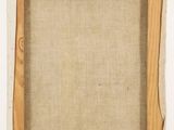 an old picture frame with a piece of wood on the bottom of it