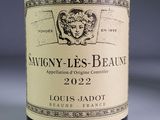 a bottle of wine that is sitting on a table