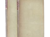 an old book with a bookmark sticking out of it ' s cover