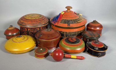 many different types of pottery on display on the table