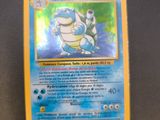 a close up of a pokemon card sitting on top of a table
