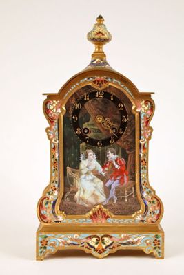 a clock with a picture of a man and a woman on it
