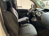 the interior of a small car with a steering wheel and a dashboard