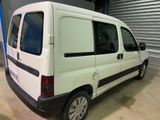 a white van that is parked in a garage