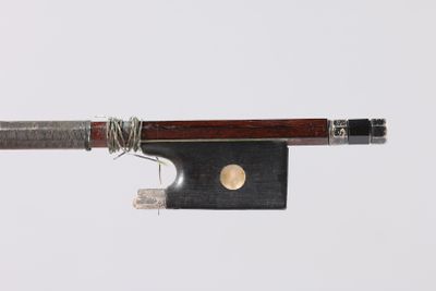 an image of a violin bow with a piece of string attached to it