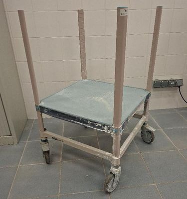 an image of a hospital room with a bed on a cart