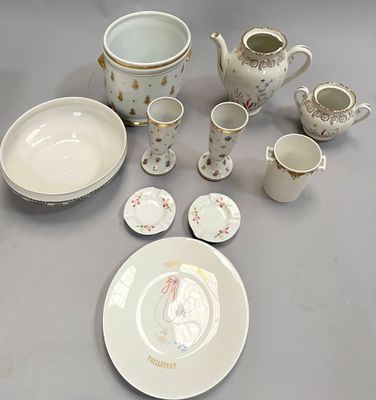 a table with a lot of dishes and cups on it