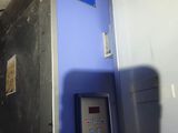 a machine that is sitting inside of a room