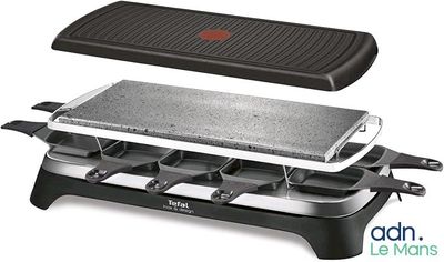a close up of an electric grill on a white background