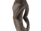 an image of a sculpture of a woman with a hat on top of her head