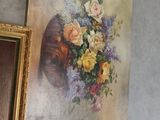a picture of a painting hanging on the wall next to a mirror