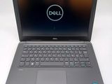 the dell laptop is open and ready to be used