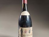 a bottle of wine that is sitting on a table