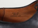 an image of a close up of a shoe with a label on it