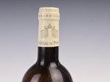 a bottle of wine that is sitting on a table