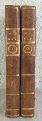 two books that are sitting on a table