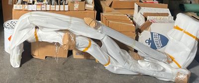 a large pile of boxes and other items in a garage