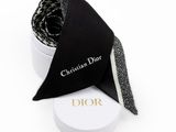 christian dior black and white scarf in a white box with a black and white bow tie