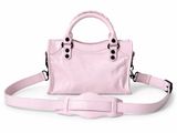 pink leather handbag with strap and buckles on a white background