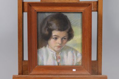 painting of a young girl in a white shirt in a wooden frame