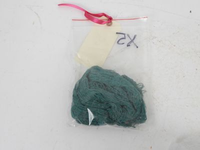 a bag of yarn with a price tag on it