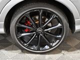 a close up of a tire on a car ' s rim