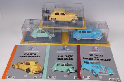 four different model cars are in a display case on a white surface