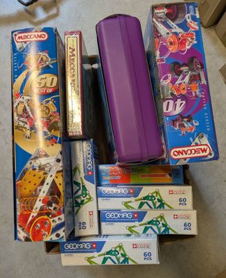 many different types of toys and games on the floor