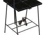 an image of a black table with a lamp on top of it