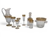 an assortment of glassware including a pitcher, glasses, and a pitcher
