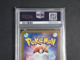 a close up of a pokemon card in a plastic case