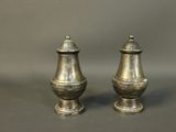 pair of antique silver salt and pepper shakers