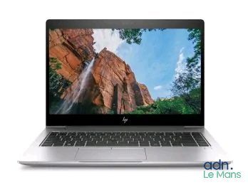 un ordinateur portable avec l'image d'une cascade à l'écran