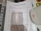 a sheet of paper that has a picture of a person ' s face on it