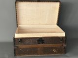an old trunk that is sitting on a table