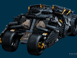 lego batman tumbler vehicle on a blue background with a dark blue background