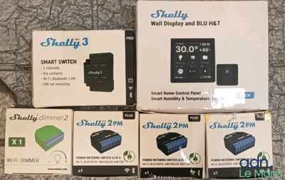 several boxes of smart devices are sitting on the floor