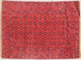 un tapis persan ancien aux motifs rouges et bleus