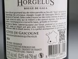 a label on a bottle of wine on a table