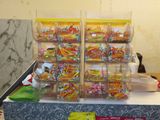 a table with a lot of candy and candy bars on it