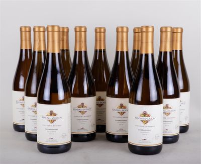 six bottles of wine are lined up in a row