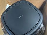 a box with a black object inside of it