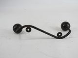 an image of a pair of black metal handles on a white surface