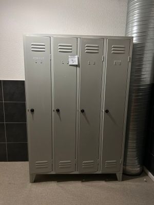 two lockers in the corner of a room