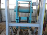 a machine that is working on pipes in a building