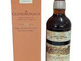 a bottle of glendronach single malt scotch whisky next to a box